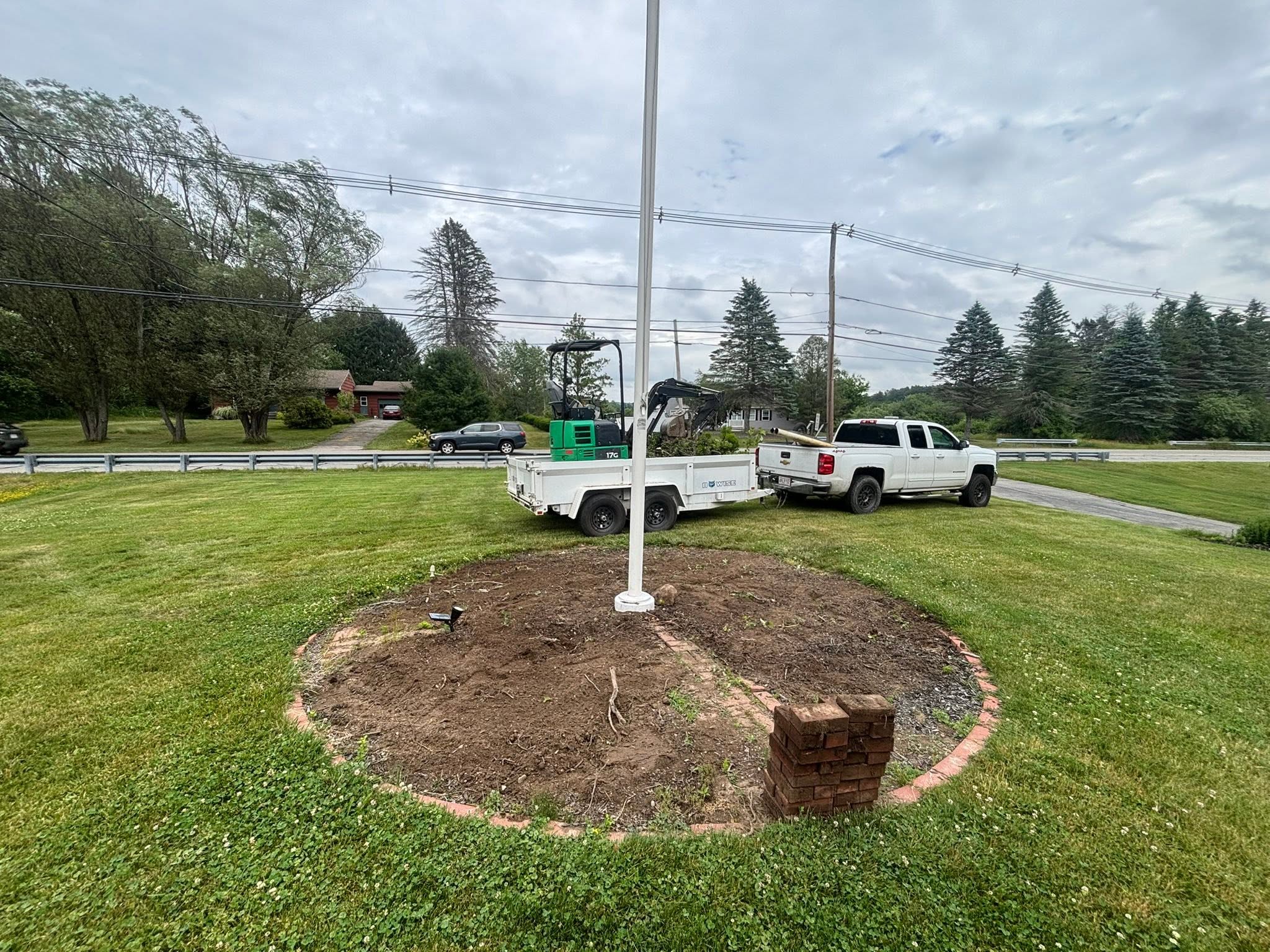 Smooth graded surface after shrub and root system removal